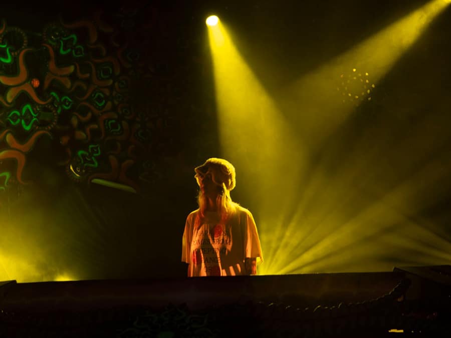 Milla303 at the decks under yellow spotlights