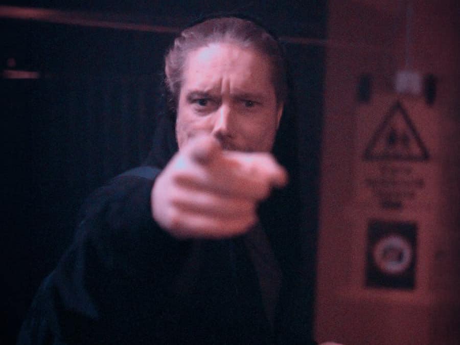 Rangtarand pointing at the camera