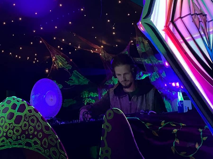 Kryptine at the decks under UV lights and glowing decor