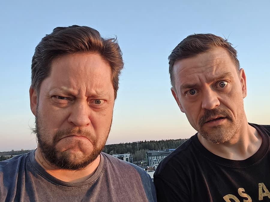 Antti Rasi and TomasoL pulling grumpy faces in a rooftop selfie