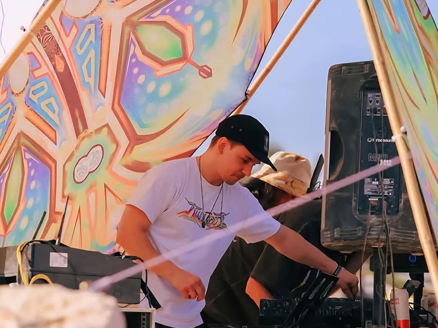 ADU at the decks under a colourful canopy