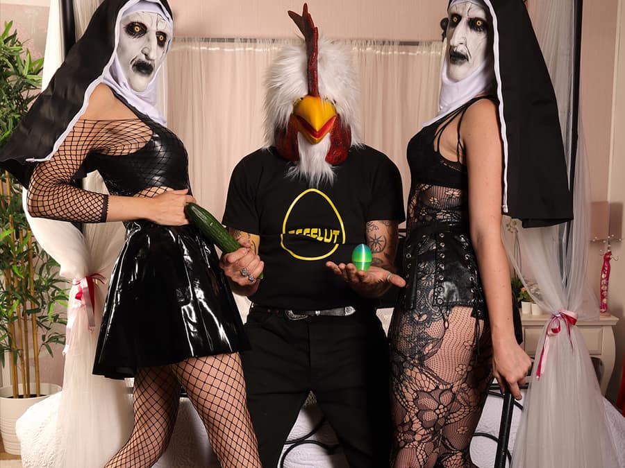 Egebamyasi in a chicken mask, flanked by two performers dressed as nuns