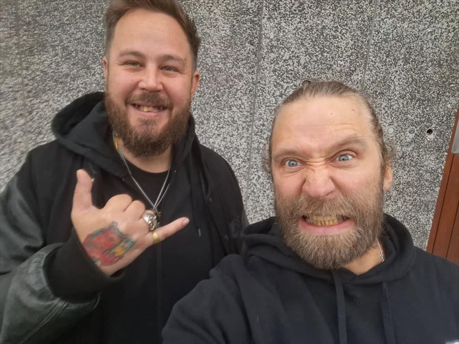 The two HappyHourBoyZ pulling faces in a selfie